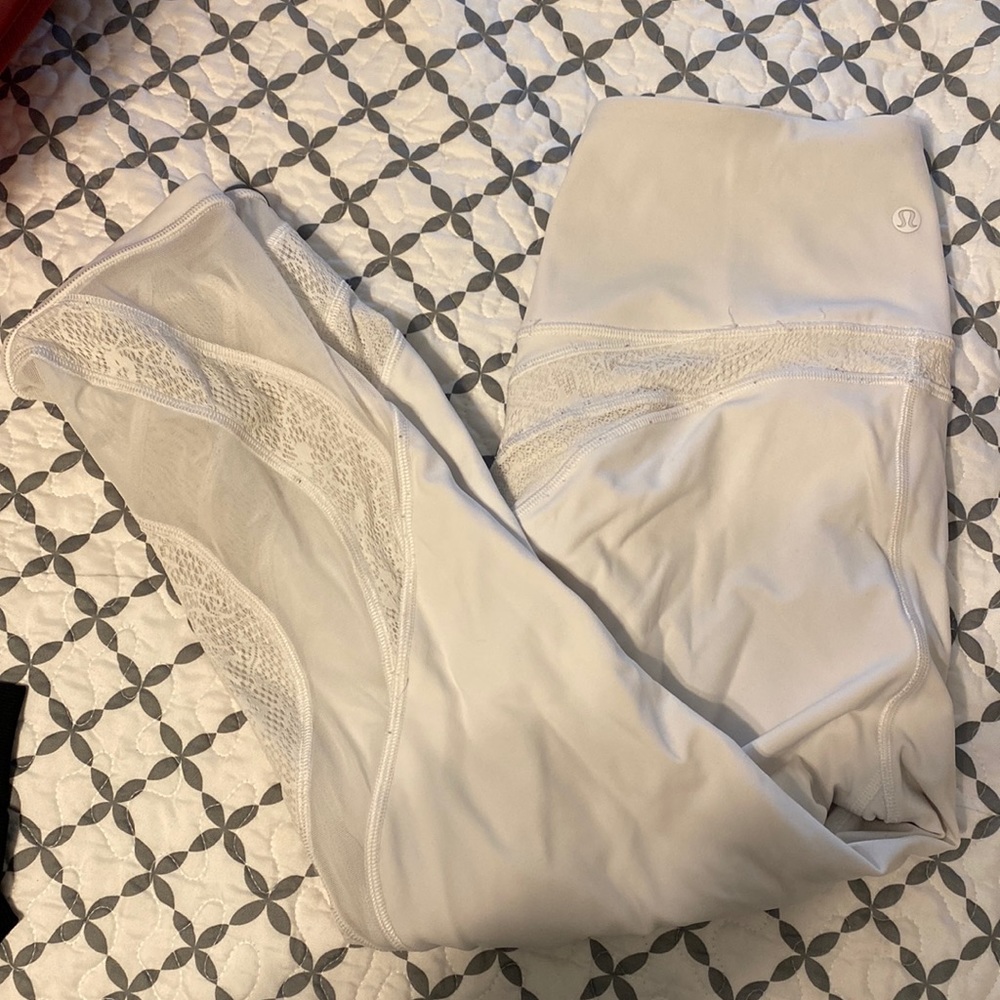 Lululemon leggings 21” length and are a size 6. They are mesh at the bottom.